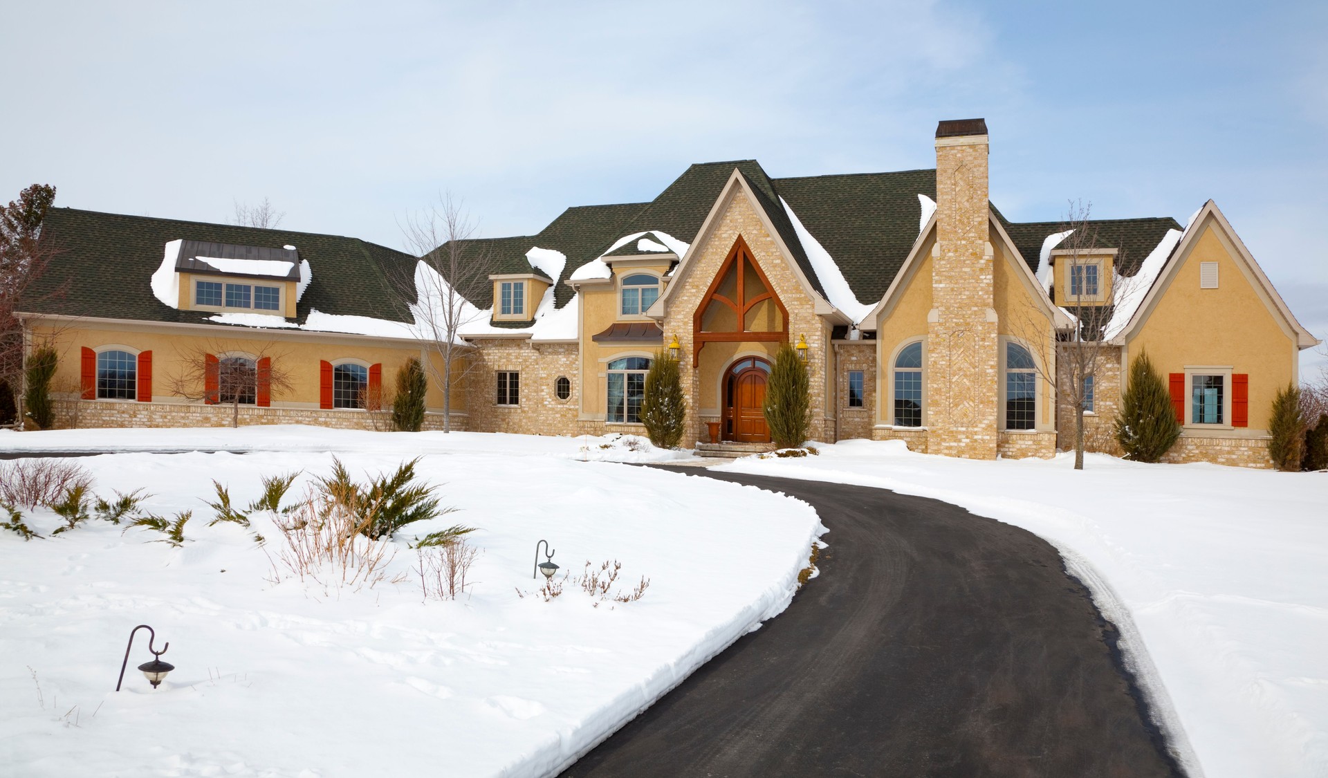 Vast Mansion Home in Winter Accented With Snow